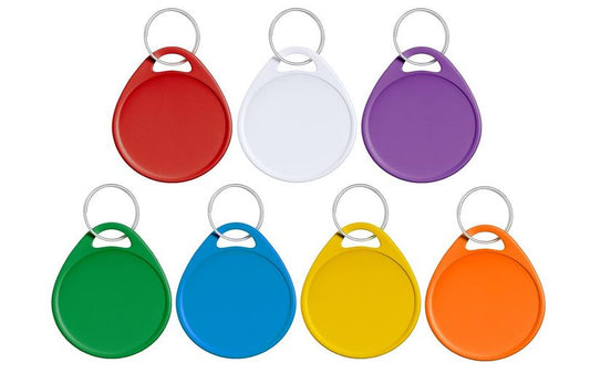 7 assorted colors keychain tags. The are teardrop shaped and come in red, white, purple, green, blue, yellow, and orange. They are used for quickly identifying specific keys or can be used to label items and attached so they don't get lost.