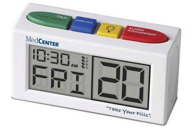 The MedCenter Talking Alarm Clock is a small but might alarm clock. It's capable of multiple alarms and always ready with a helpful reminder to take your meds. It's white with a digital screen displaying the time, day of the week and month. Has 4 buttons on top, the left green button is the talking function, the blue button next to it is for an alarm check, the yellow button beside that is for lighting the screen and display and lastly the large red button is for acknowledging the alarm to get it to shut up
