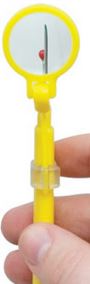 The seam ripper is a yellow tool that has a long pointed tip, a shorter tip with a red cap on it and nestled in between is the blade to cut the seam. Also includes and adjustable 5x spot magnifier.