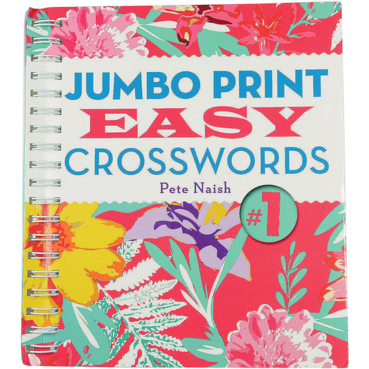 The cover of the crossword puzzle features a colorful floral print with a white section breaking up the floral design. In large blue letters the words Jump Print Crosswords is written and EASY is is also written in pink.