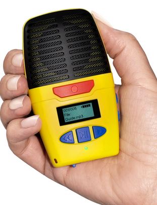 The Micro Speak Plus is a small hand held recorder. It is yellow with a small digital screen that displays the battery life and how many files have been saved. Beneath the screen are 3 blue buttons used for playing the message as well as cycling through saved files. Above the screen is a red button for recording. The top part is the speaker and is black.