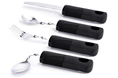 A set of utensils containing a knife, fork, teaspoon and tablespoon made from stainless steel. They have large black handles for easy gripping.