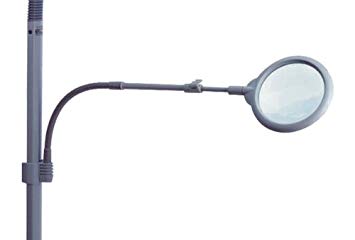 A magnifier that comes with an adjustable clip so it can attach to floor lamps