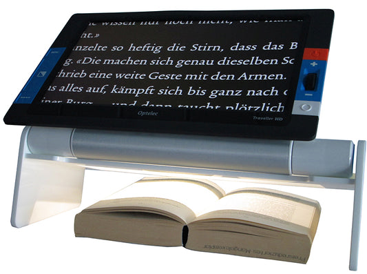 The Traveler sitting on the reading stand which is over a German book