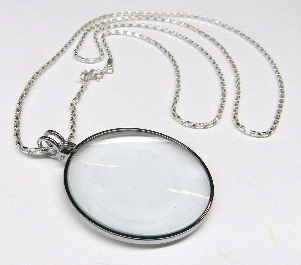 Always be prepared and look stylish while doing it with this silver pendant magnifier with chain